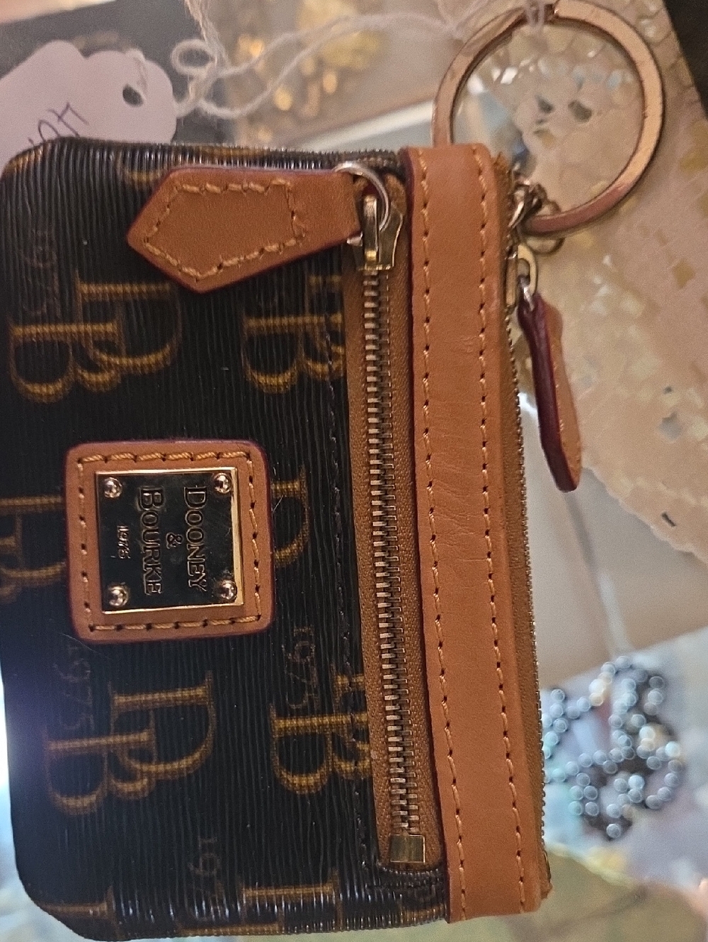 Dooney & Bourke Black Signature Wristlet with Tan Trim and Gold Hardware